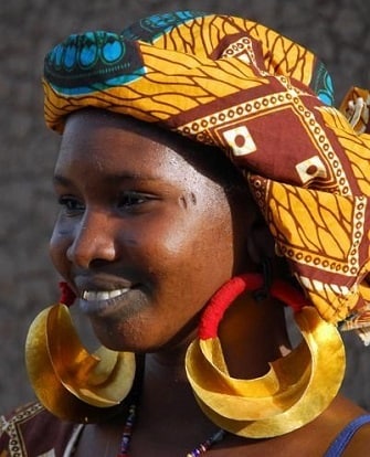 Girl wearing Fulani earrings